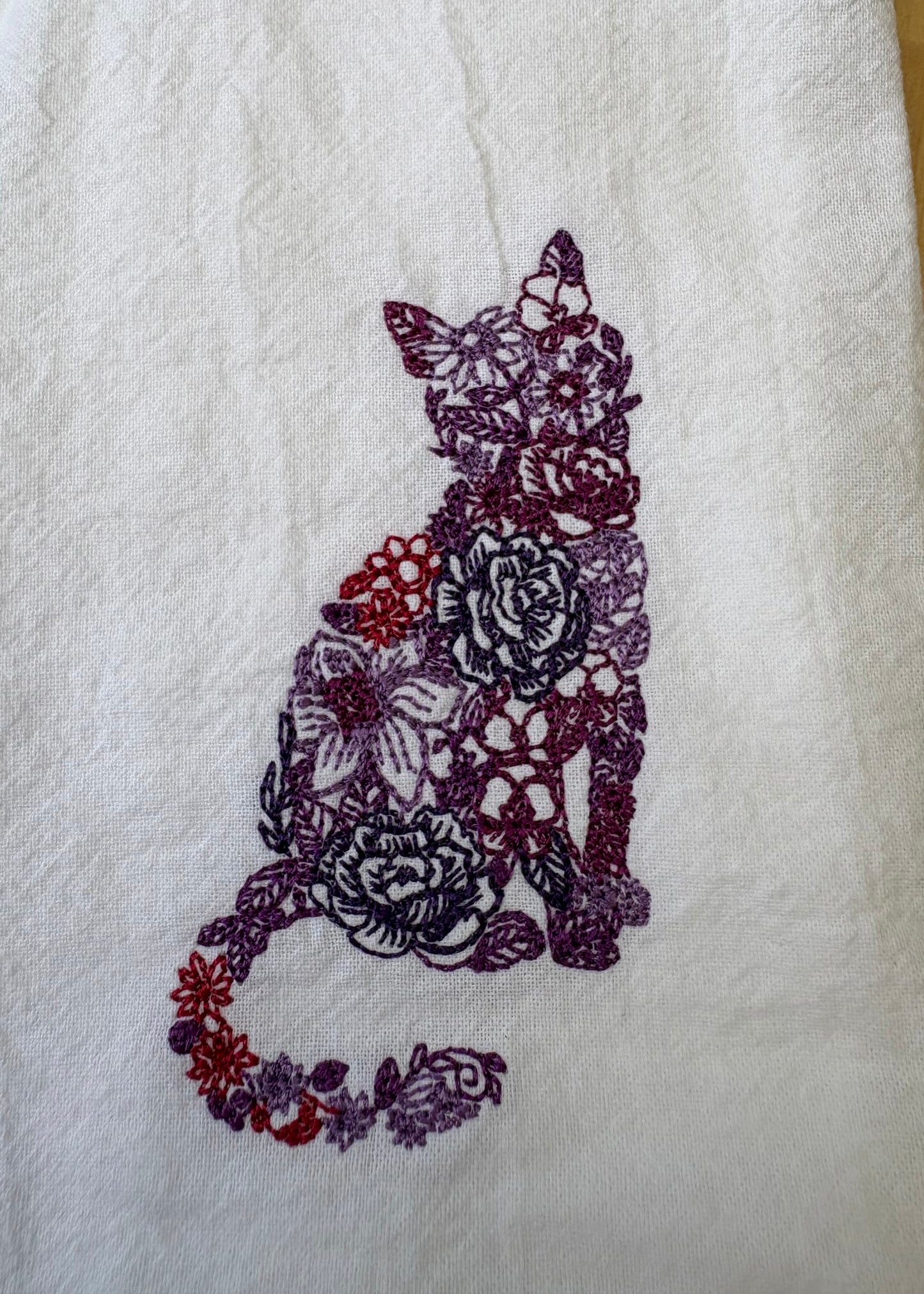 Bring a splash of fun to your dining with this delightful floral cat dinner napkin. Set against a crisp white background, it’s not only beautiful but also machine washable and reusable, making it perfect for everyday use or special occasions. Add a playful touch to your table that’s as practical as it is charming!