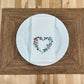 Wildflower heart embroidered on white dinner napkin