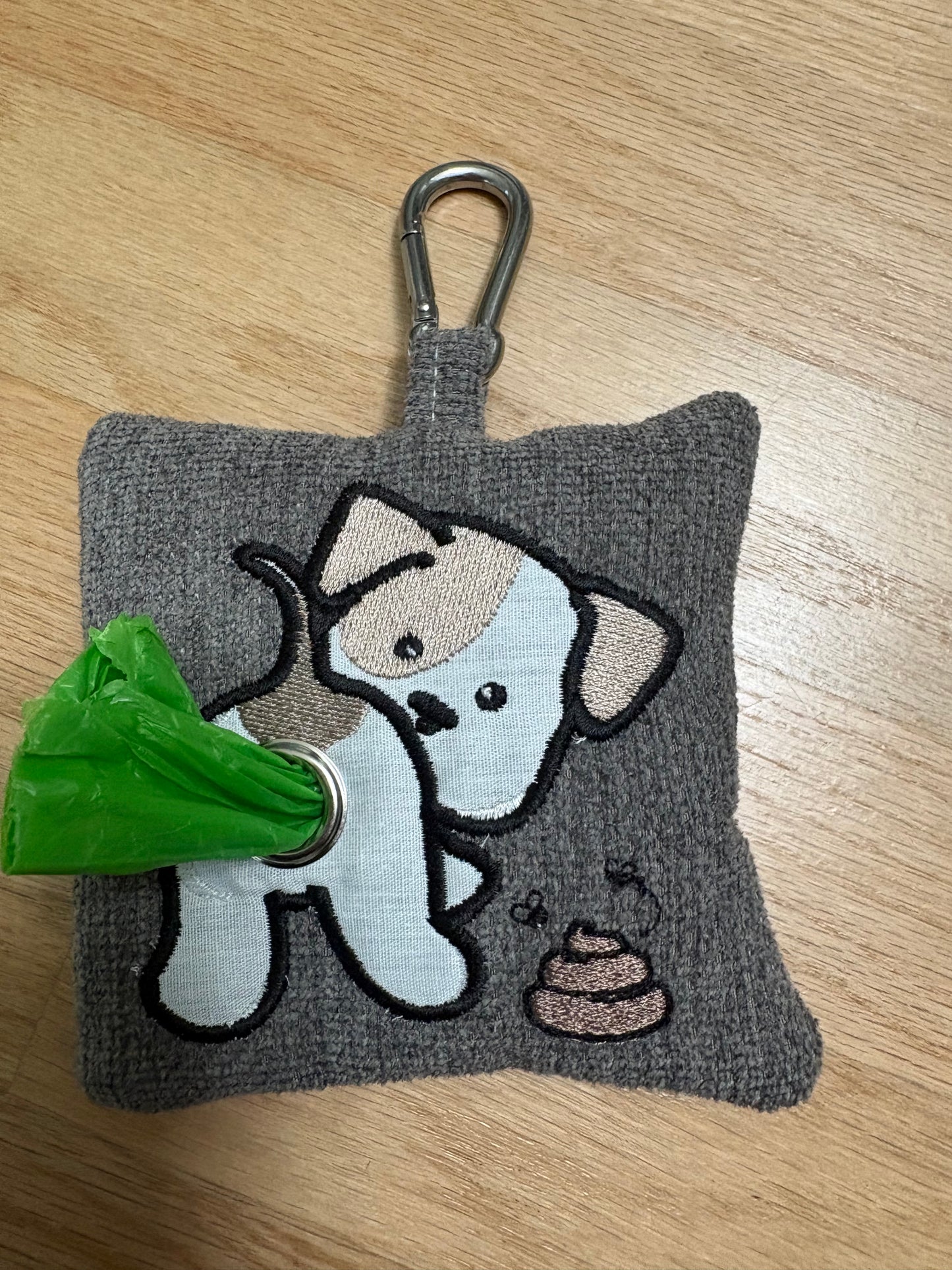 Dog poop bag dispenser