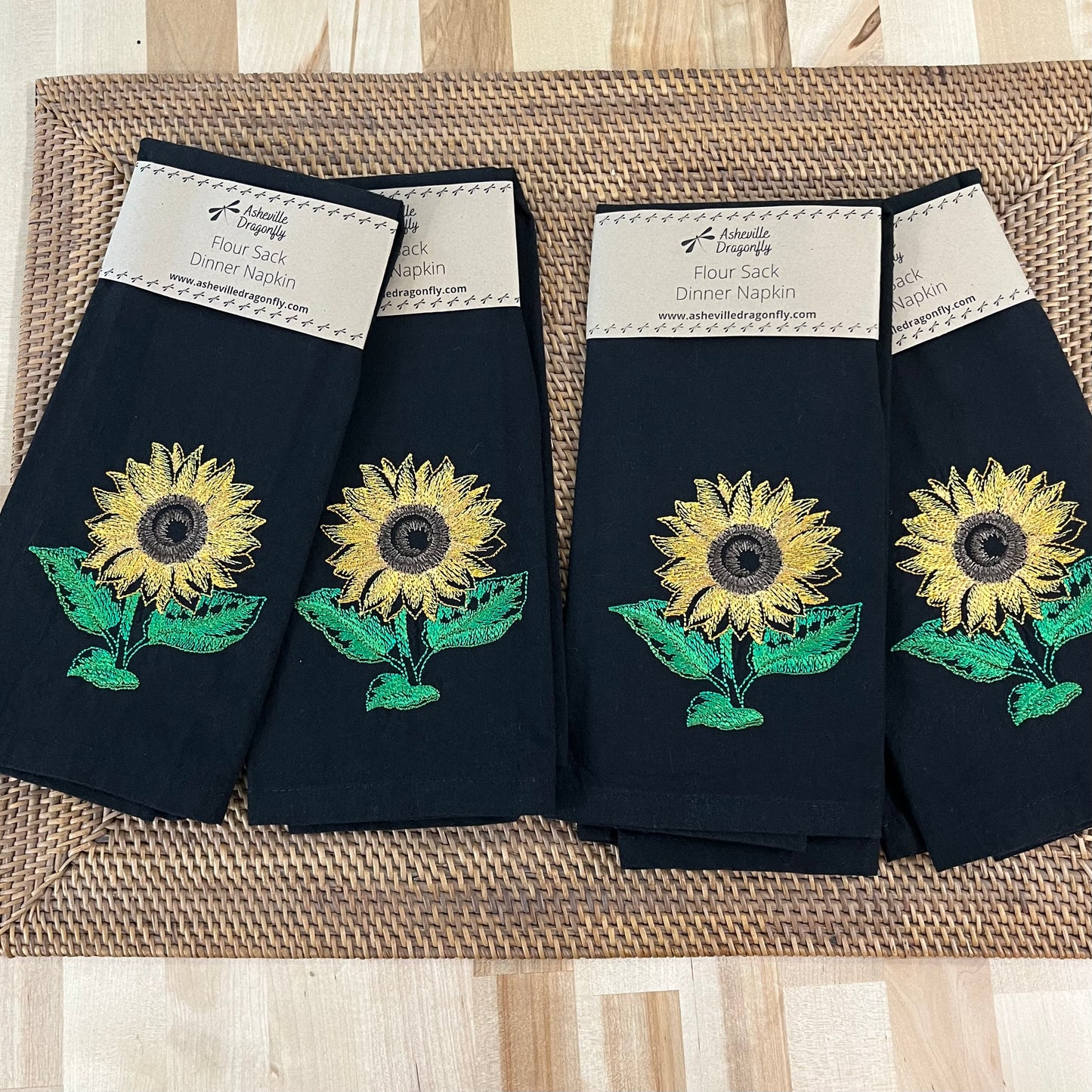 Sunflower embroidered on black dinner napkin