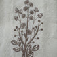 Delicate stems embroidered on natural flour sack napkins