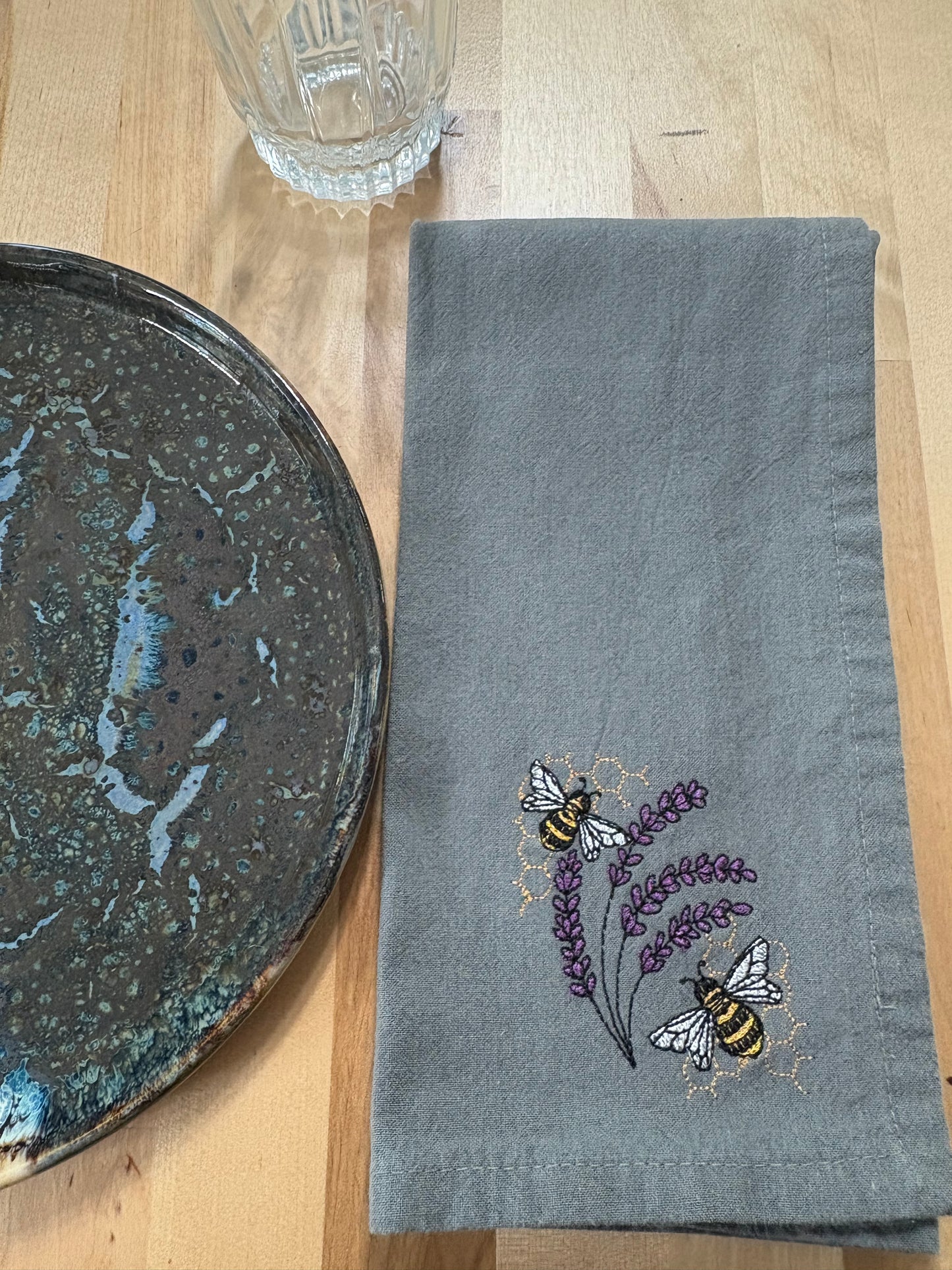 Dinner napkin - buzzing bees embroidered on grey napkins