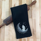 Crescent moon with a stack of books and cup of coffee kitchen towel