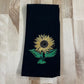 Sunflower embroidered on black dinner napkin