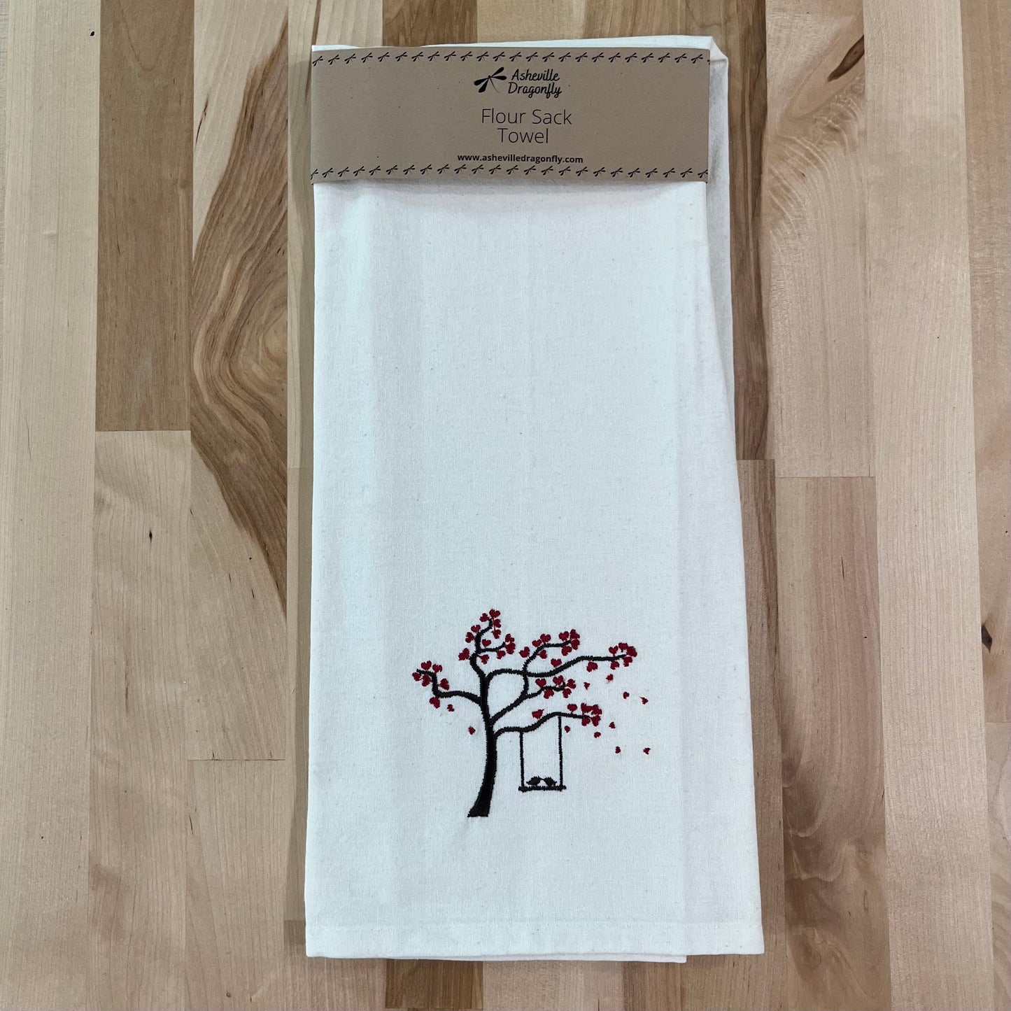 Organic flour sack towel embroidered with love birds on a swing