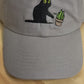 Cat knocking over plant embroidered on ran dad hat